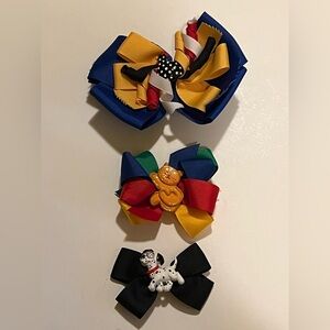 LOT OF 3 KID’S HAIR BOWS.